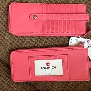 Munro zippered cash and card wallet. NWT coral color.